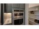 Bright walk-in pantry with ample shelving for storage at 1565 Bowers Store Rd, Siler City, NC 27344
