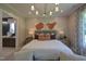 Main bedroom with ensuite bathroom and ample natural light at 1565 Bowers Store Rd, Siler City, NC 27344