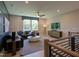 Open concept bonus room with a modern aesthetic and plenty of natural light at 1565 Bowers Store Rd, Siler City, NC 27344