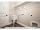 Laundry room with utility sink, shelving and hookups at 3806 River Mill Ln, Franklinton, NC 27525