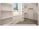 Spacious walk-in closet with ample shelving and hanging space at 3806 River Mill Ln, Franklinton, NC 27525