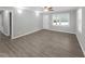 Spacious living room with hardwood floors and neutral wall colors at 112 Bradsher Rd, Roxboro, NC 27574