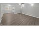 Open living area with hardwood floors and access to other rooms at 112 Bradsher Rd, Roxboro, NC 27574
