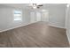Bright living room with hardwood floors and neutral wall colors at 112 Bradsher Rd, Roxboro, NC 27574