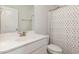 Clean bathroom with white vanity and colorful shower curtain at 228 Vintage Point Ln, Wendell, NC 27591