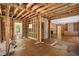 Kitchen undergoing renovation, exposed beams and framing visible at 2445 Pineway Dr, Burlington, NC 27215