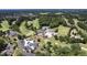 Aerial view of golf course community with clubhouse at 2445 Pineway Dr, Burlington, NC 27215