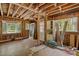 Renovation in progress, showing new flooring and exposed framing at 2445 Pineway Dr, Burlington, NC 27215
