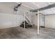 Attached garage with concrete floor and overhead door at 2445 Pineway Dr, Burlington, NC 27215