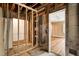 Unfinished bathroom with exposed framing and plumbing at 2445 Pineway Dr, Burlington, NC 27215