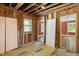 Unfinished bedroom undergoing renovation, exposed framing and subfloor at 2445 Pineway Dr, Burlington, NC 27215