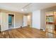 Spacious bedroom with hardwood floors and an open doorway at 2445 Pineway Dr, Burlington, NC 27215
