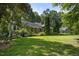 Ranch home with stone accents and a large yard at 2445 Pineway Dr, Burlington, NC 27215