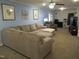 Spacious living room with sectional sofa and light blue walls at 812 Siler City Glendon Rd, Siler City, NC 27344