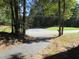 Property entrance with mailbox and wooded area at 812 Siler City Glendon Rd, Siler City, NC 27344