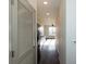 Light and bright entryway with view into kitchen at 2326 Gathering Sq Ct, Fuquay Varina, NC 27526