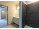 Bathroom with vanity, shower, and view of bedroom at 2326 Gathering Square Ct # 322, Fuquay Varina, NC 27526