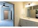 Bathroom with vanity and view of bedroom at 2326 Gathering Sq Ct, Fuquay Varina, NC 27526