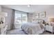 Cozy bedroom with striped bedding and wood nightstands at 2620 Stonington Dr, Cary, NC 27523