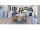 Modern kitchen with gray cabinets, island, and stainless steel appliances at 2620 Stonington Dr, Cary, NC 27523