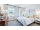Well-lit bedroom featuring a comfortable bed and neutral tones at 2620 Stonington Dr, Cary, NC 27523