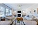 Spacious living room with fireplace and ample natural light at 2620 Stonington Dr, Cary, NC 27523