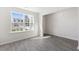 Bright living room with large window and grey vinyl plank flooring at 328 Leven Dr, Gibsonville, NC 27249