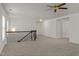 Spacious upper landing with staircase and ceiling fan at 108 Sleeper Car Ln, Garner, NC 27529