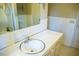 Bathroom with sink, vanity, and large mirror at 513 Clayton Ave, Roxboro, NC 27573