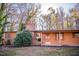 Front view of a ranch home with covered porch and landscaping at 513 Clayton Ave, Roxboro, NC 27573