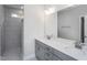 Modern bathroom with double vanity and walk-in shower at 1230 Linkwood, Homesite 44, Fuquay Varina, NC 27526