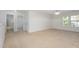 Bright and airy bedroom with plush carpeting at 517 Birchrun Dr, Durham, NC 27712