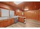 Kitchen with wood cabinets, stainless steel appliances and wood flooring at 435 Tant Rd, Zebulon, NC 27597