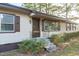 House exterior with light beige siding, brown accents and a front porch at 435 Tant Rd, Zebulon, NC 27597