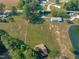Aerial view showing home, outbuildings, and large lot at 435 Tant Rd, Zebulon, NC 27597
