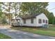 House exterior view with driveway and landscaping at 435 Tant Rd, Zebulon, NC 27597