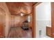 Exercise room with wood paneling, adjacent to bathroom at 435 Tant Rd, Zebulon, NC 27597