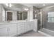 Bathroom with double sinks, a shower and modern finishes at 23 Eagle Crest Ct # Holly English Country, Lillington, NC 27546