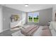 Well lit bedroom with large windows and backyard view at 23 Eagle Crest Ct # Holly English Country, Lillington, NC 27546