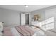 Spacious bedroom with double doors and a view at 23 Eagle Crest Ct # Holly English Country, Lillington, NC 27546