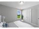 Bedroom with double doors and window at 23 Eagle Crest Ct # Holly English Country, Lillington, NC 27546