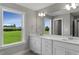 Bathroom with double vanity and large mirror at 23 Eagle Crest Ct # Holly English Country, Lillington, NC 27546