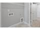 Laundry room with built-in shelving at 23 Eagle Crest Ct # Holly English Country, Lillington, NC 27546