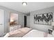 Bedroom with double doors and wall art at 23 Eagle Crest Ct # Holly English Country, Lillington, NC 27546