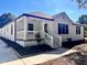 Newly renovated white brick home with front porch at 1011 Lemon Dr, Durham, NC 27705