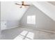 Bright bedroom with grey walls, grey carpet, and a ceiling fan at 2024 Stanchion St, Haw River, NC 27258