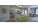 Modern kitchen with stainless steel appliances and breakfast bar seating at 1915 Frost Dr, Haw River, NC 27258