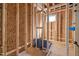 Unfinished bathroom with shower pan and framing at 111 N Guthrie Ave, Durham, NC 27703