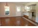 Bright dining room with hardwood floors and kitchen access at 5906 Lillian Dr, Hurdle Mills, NC 27541