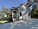 White house exterior with a covered porch and large yard at 2710 - A Mansfield Ave, Durham, NC 27703